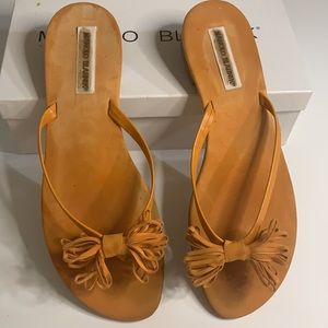 Manolo Blahnik size 11 orange suede tasseled flips